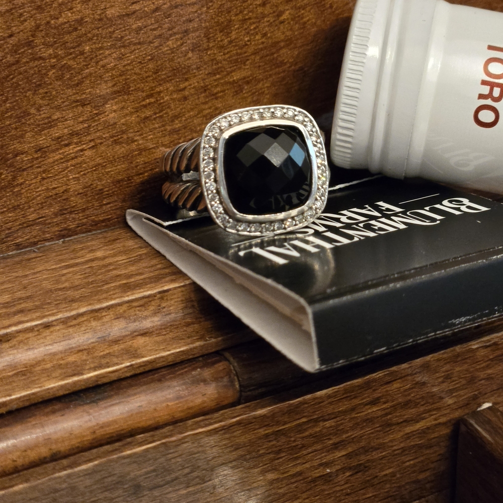 Elegant Black Onyx and Silver DY Ring with Halo Accent